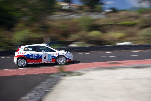 Rally car zooming through San Jose, Breña Baja