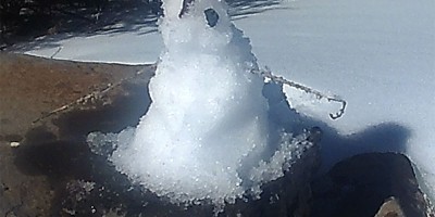 A foot-high snowman