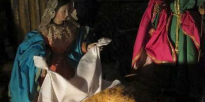 The nativity scene in Las Nieves church on Christmas Eve with a kitten in place of baby Jesus